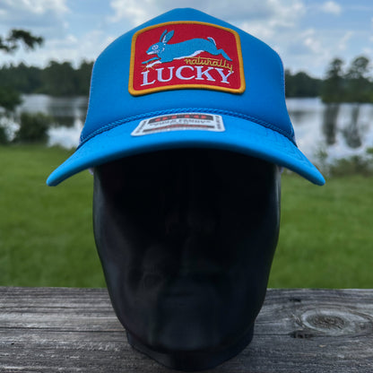 Naturally Lucky | Neon Blue and White Otto Foam Front Rope Trucker Hat